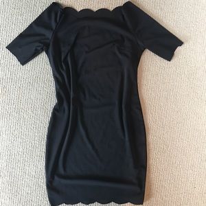 Black scallop scoop neck mini dress